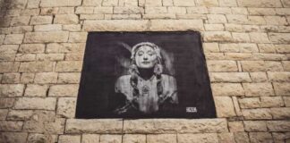 Ginevra alla finestra in Via Fieramosca: nuovo murale dello street artist Rizek a Barletta
